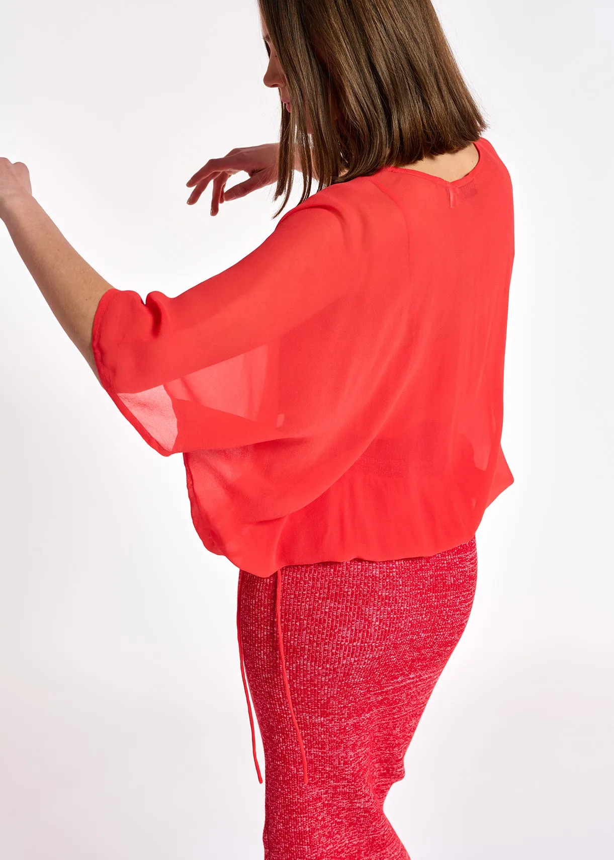 Red voluminous sheer top